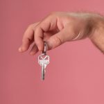 person holding a key stockpack pexels